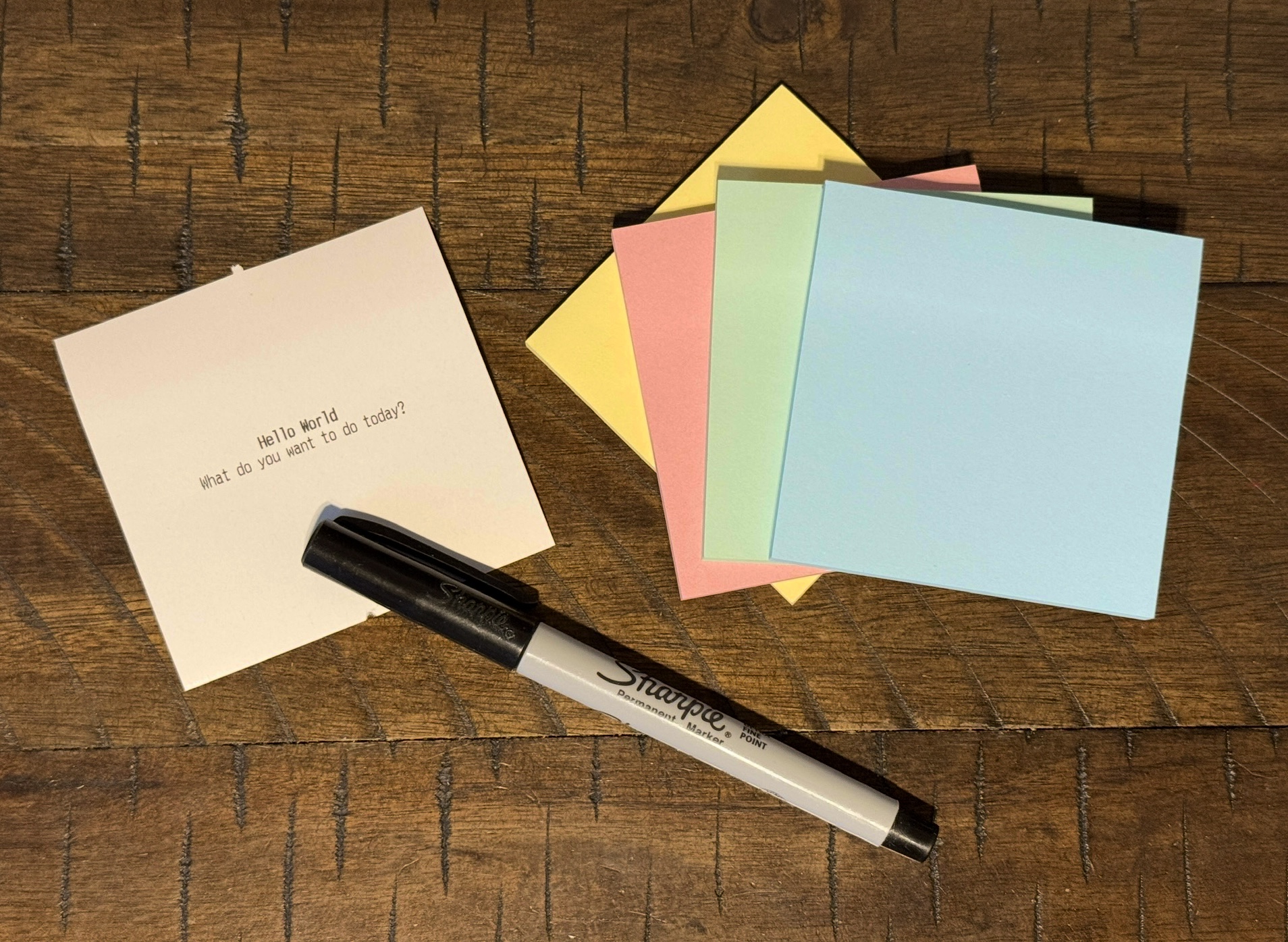 Thermal Printed Receipt and Sticky Notes on Desk with Pen